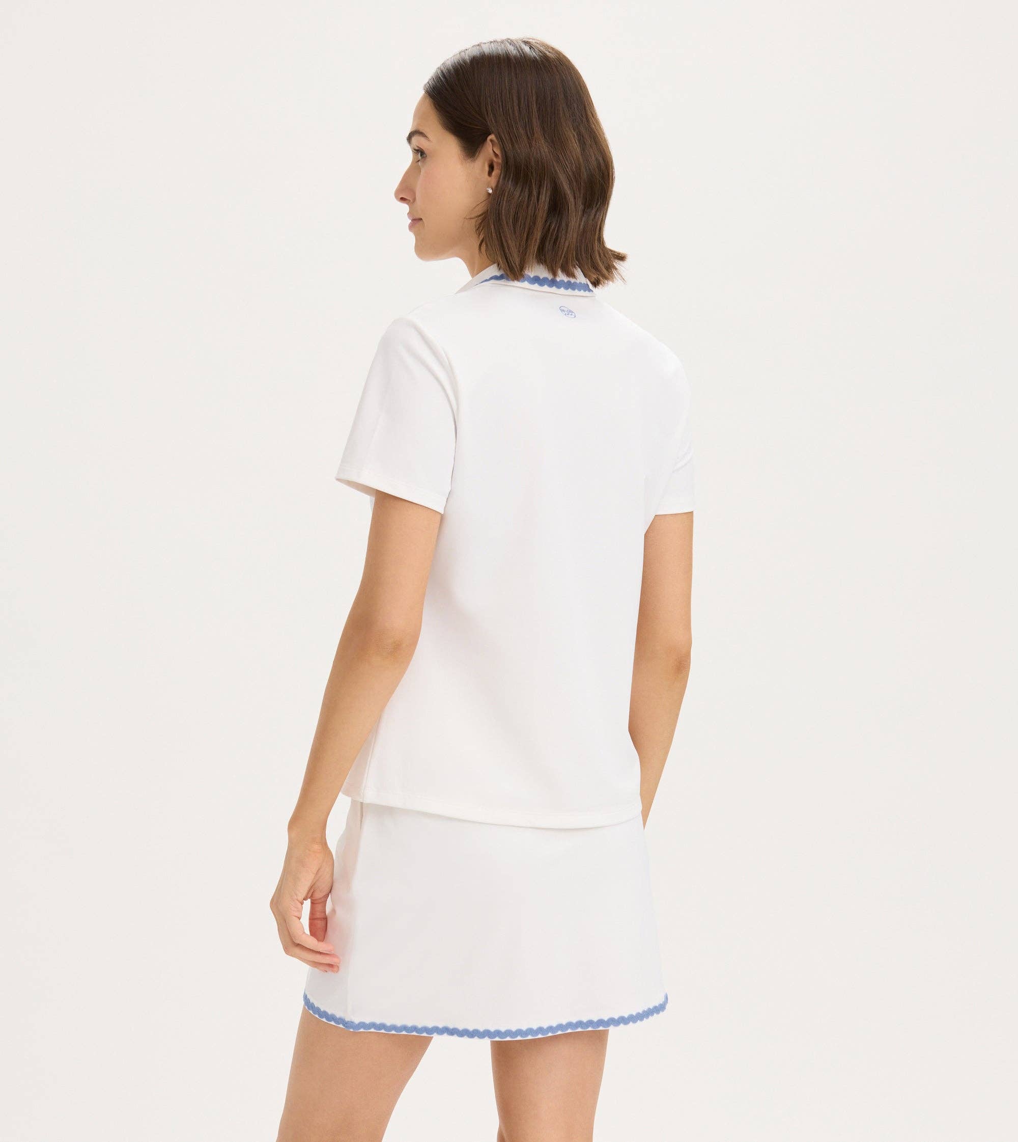 The Ric Rac Performance Polo: A Feminine Twist on a Timeless Classic