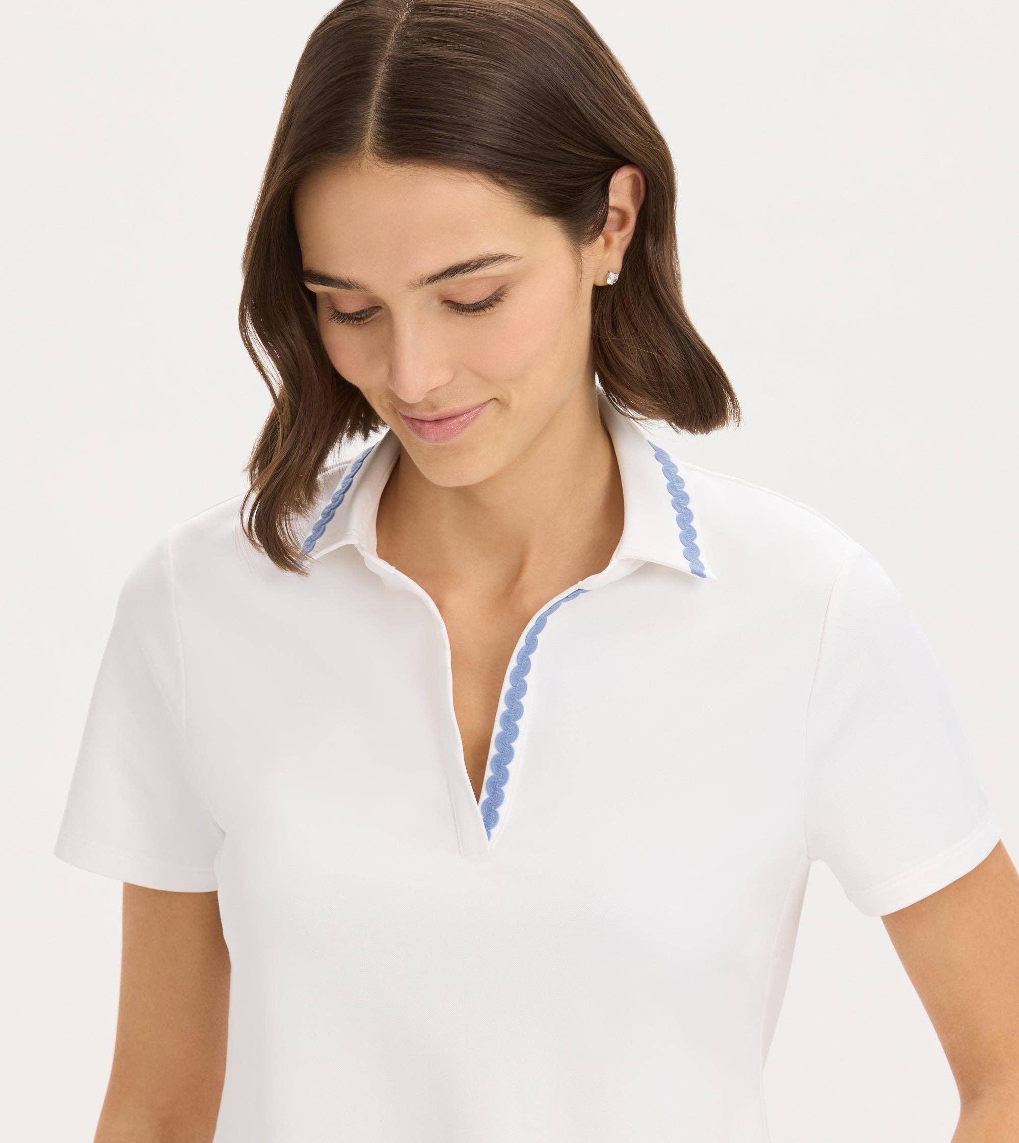 The Ric Rac Performance Polo: A Feminine Twist on a Timeless Classic