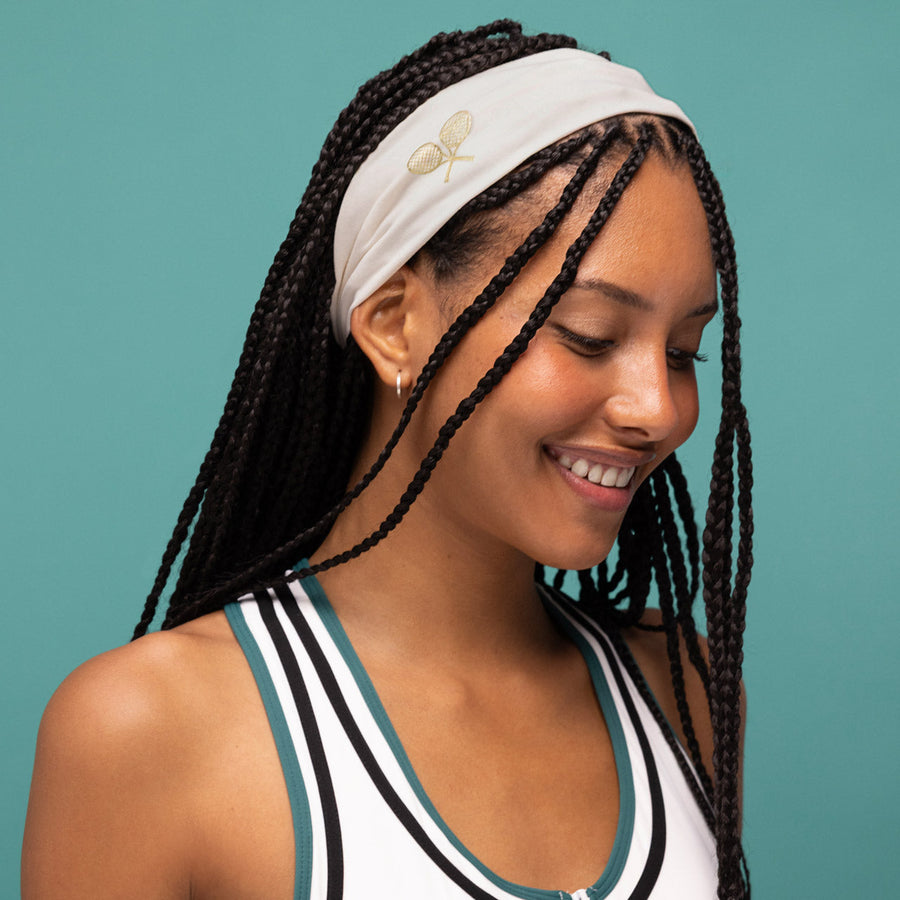 KITSCH — Model in the tennis active headband, teal background