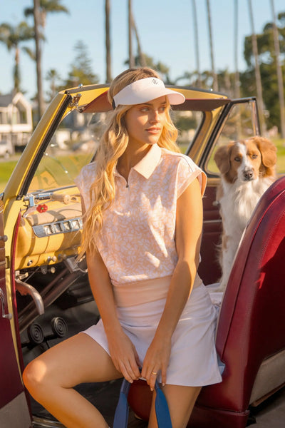 Birdie & Ace Lily Tennis Polo in Peach Floral — back view