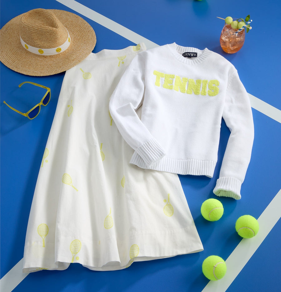 RNWK — Tennis collection flat lay with sweater and hat