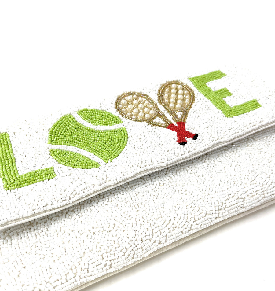 Close-up of hand-sewn seed beads on a Twine and Love tennis clutch